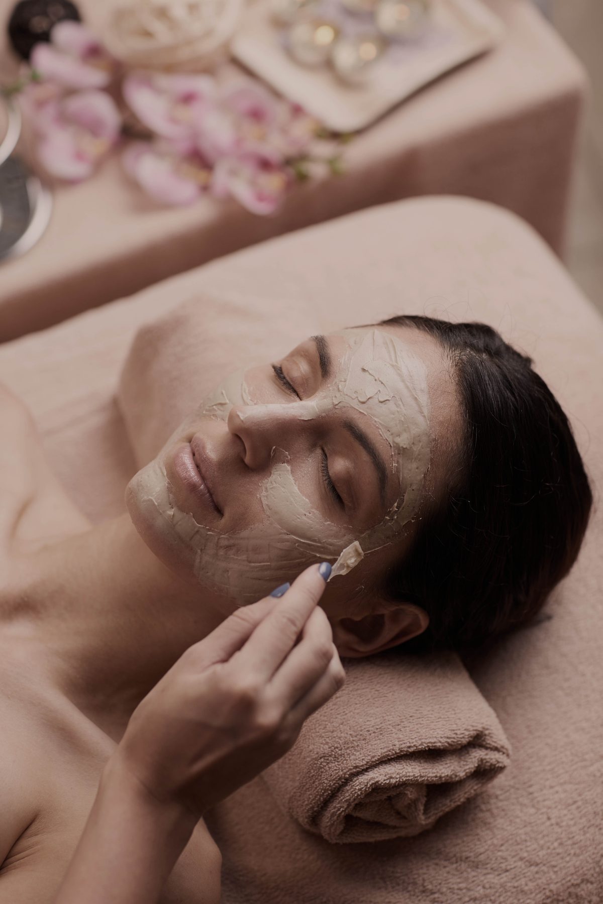 Bride receiving a private bridal facial treatment before her Orlando wedding